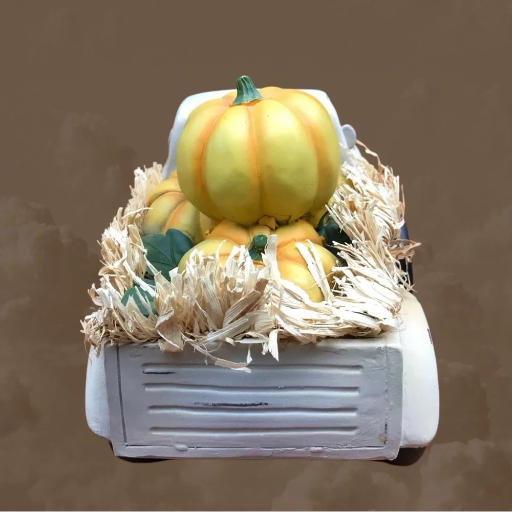 Plow & Hearth in orig.box vintage truck full of pumpkins. Great fall display.